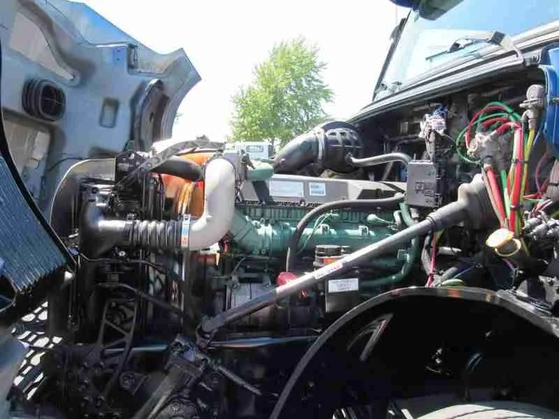 Close-up of a truck engine bay during inspection